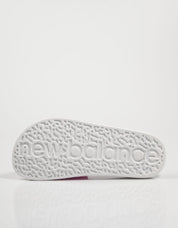 CHANCLAS NEW BALANCE SUF50 en color Fuxia