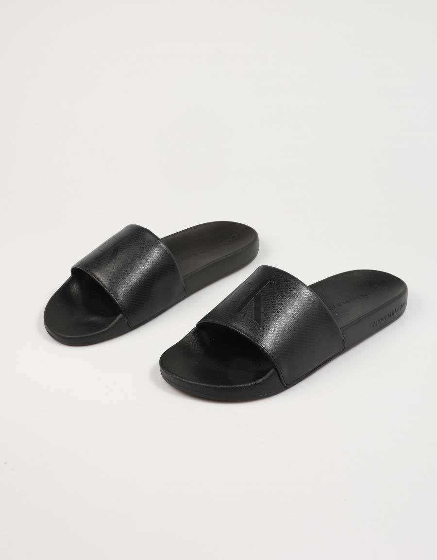 CHANCLAS CALVIN KLEIN MIAMI SLIDE AOP PRINT en color Negro