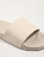Chanclas Calvin Klein Miami Slide AOP Print en Farbe Beige