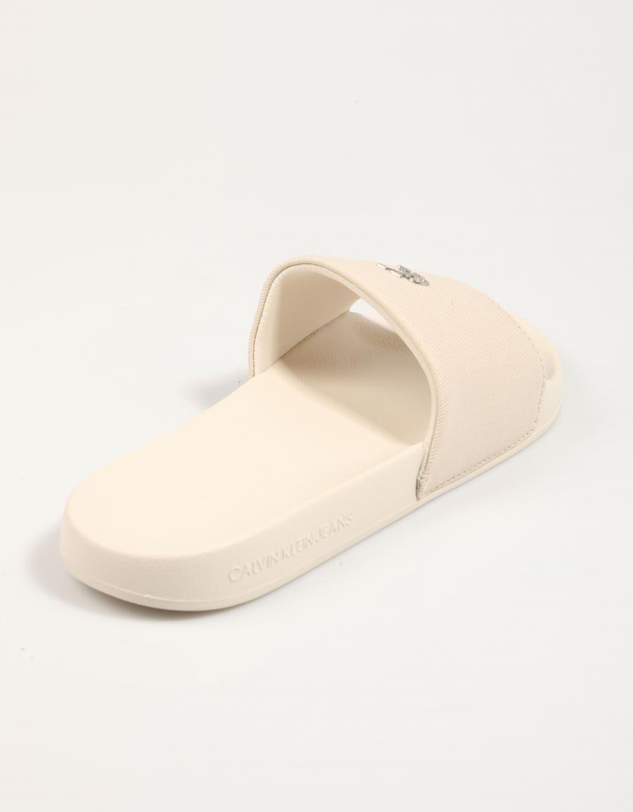 Chanclas Calvin Klein Miami Slide Monogramm Hardware in Farbe Beige
