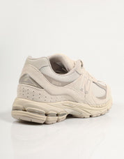 Baskets NEW BALANCE U2002 en couleur beige