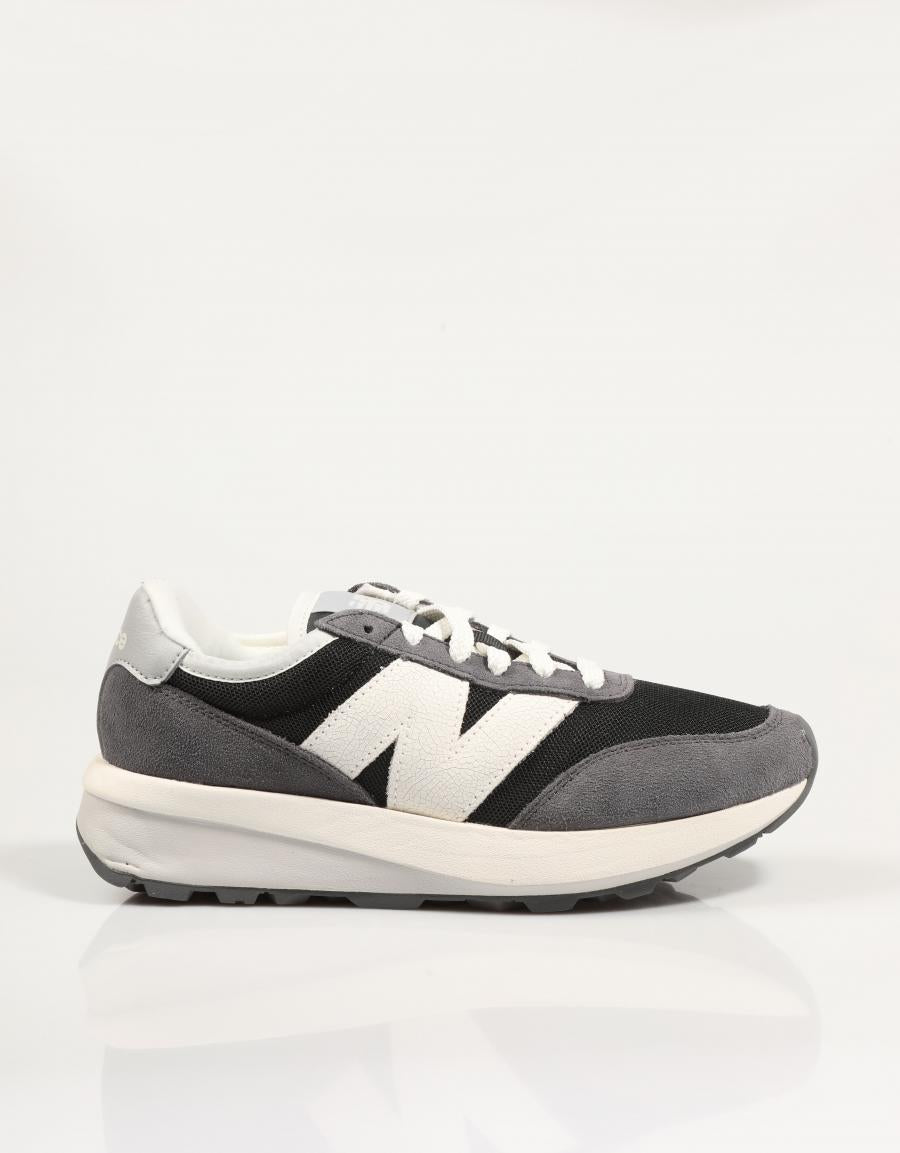 Turnschuhe NEW BALANCE u370 in schwarzer Farbe