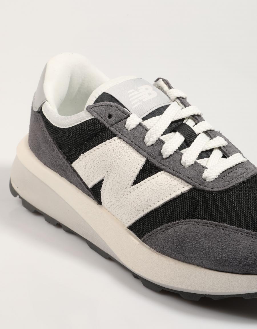 Turnschuhe NEW BALANCE u370 in schwarzer Farbe