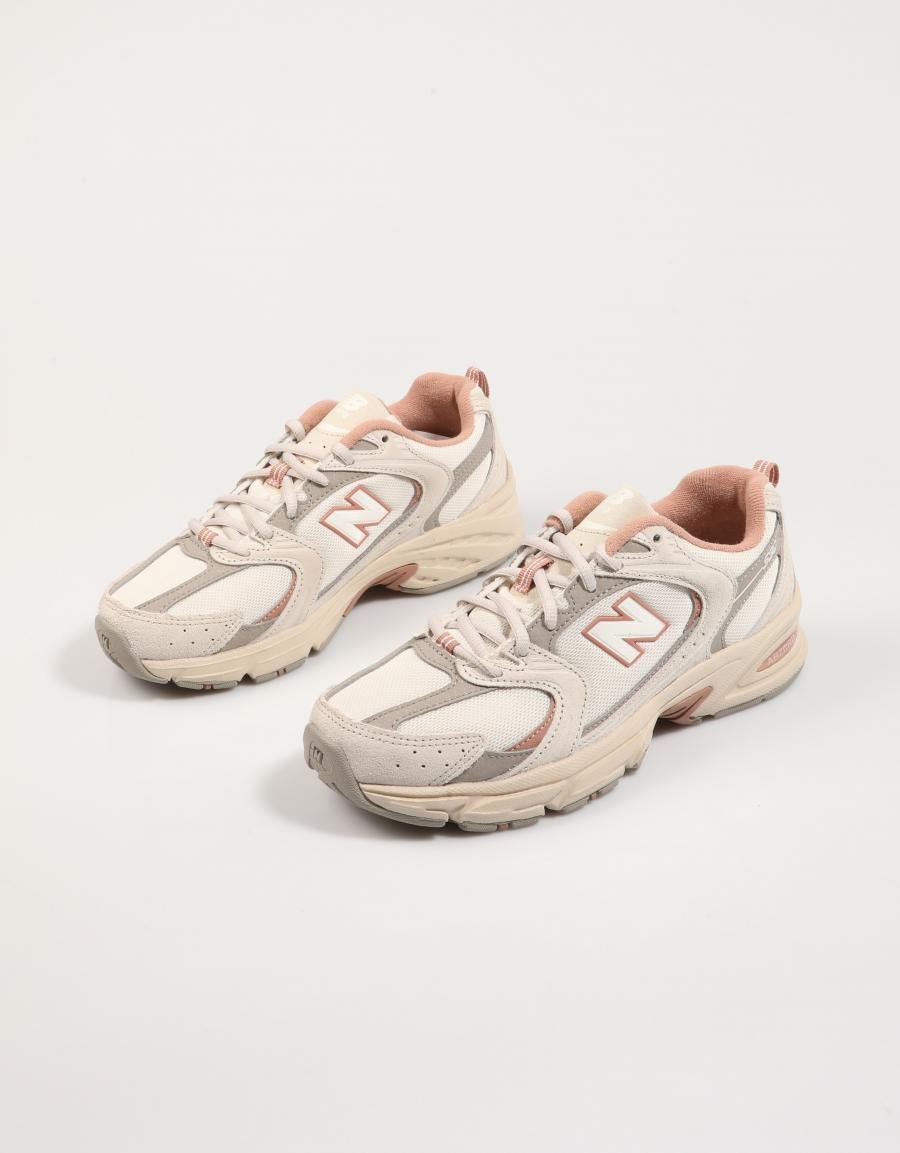 Tênis NEW BALANCE U530 em bege