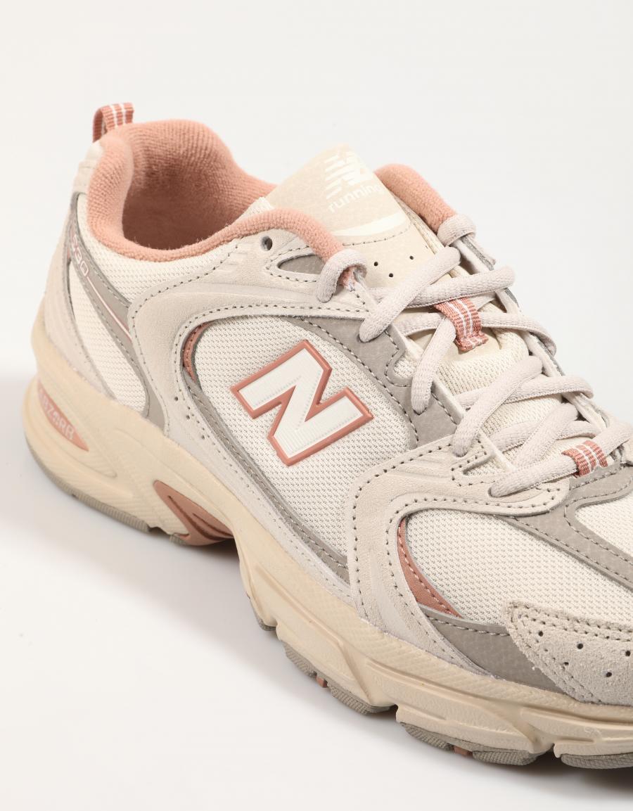Tênis NEW BALANCE U530 em bege