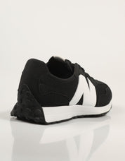Turnschuhe NEW BALANCE GS327 in schwarzer Farbe