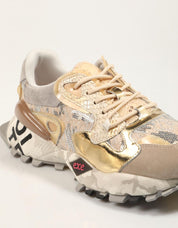 ZAPATILLAS EXE 134 10 en color Oro