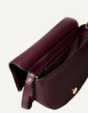 BOLSO CALVIN KLEIN RAISED CK SADDLE CROSSBODY en color Burdeos