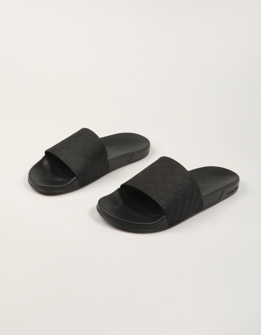 CHANCLAS CALVIN KLEIN ESS SLIDE PU AOP en color Negro