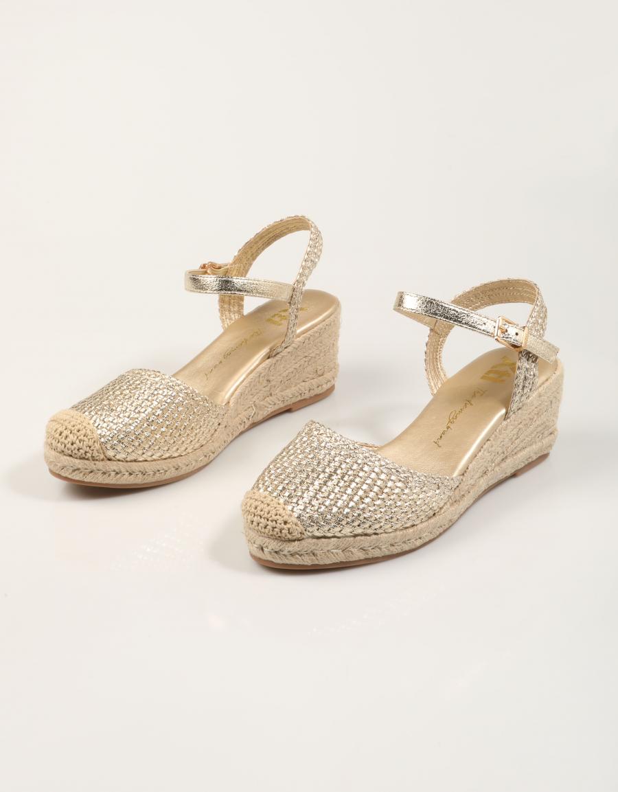 ESPARDEÑAS XTI CUÑA TRENZADO ORO en color Oro