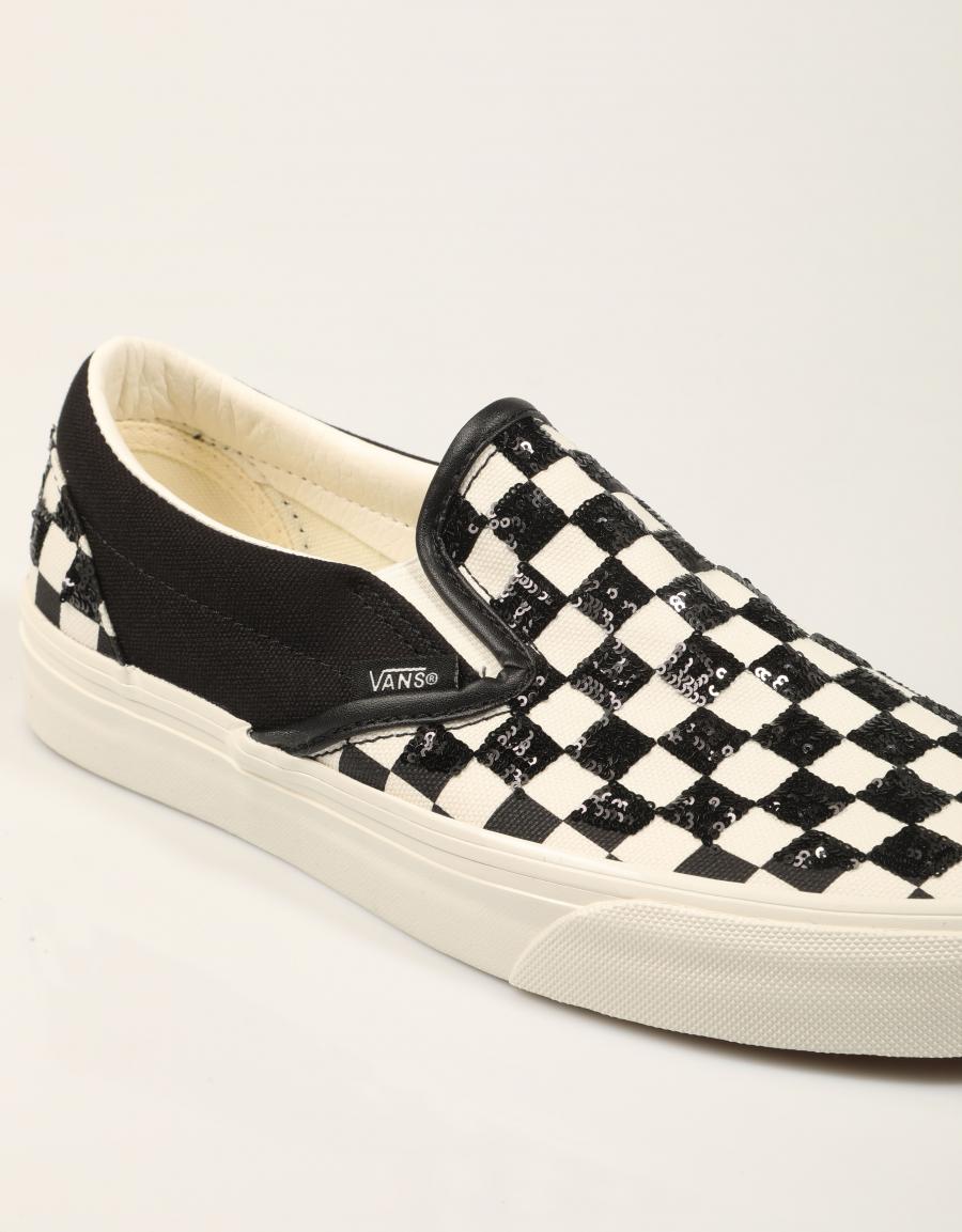 ZAPATILLAS VANS SLIP ON WHITE/BLACK en color Negro