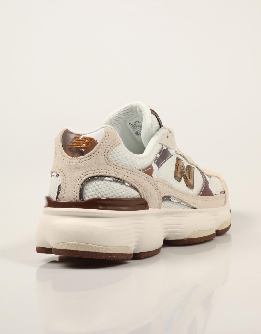 ZAPATILLAS NEW BALANCE W603 42R en color Beige