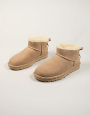 BOTINES UGG MINI BAILEY SAND 1185491 en color Beige