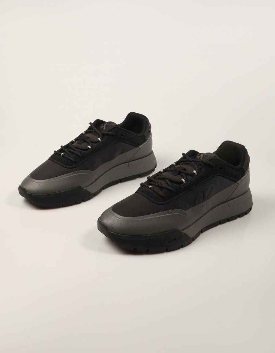 ZAPATILLAS CALVIN KLEIN TOOTHY BLACK HM0HM02390 en color Negro